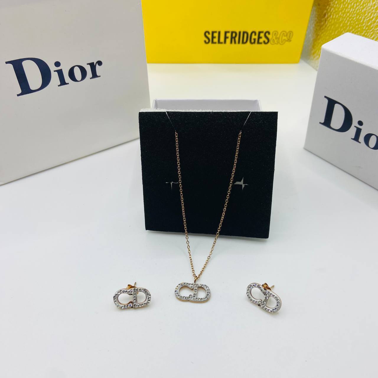 CD DIO earings and necklace set with packaging to0105