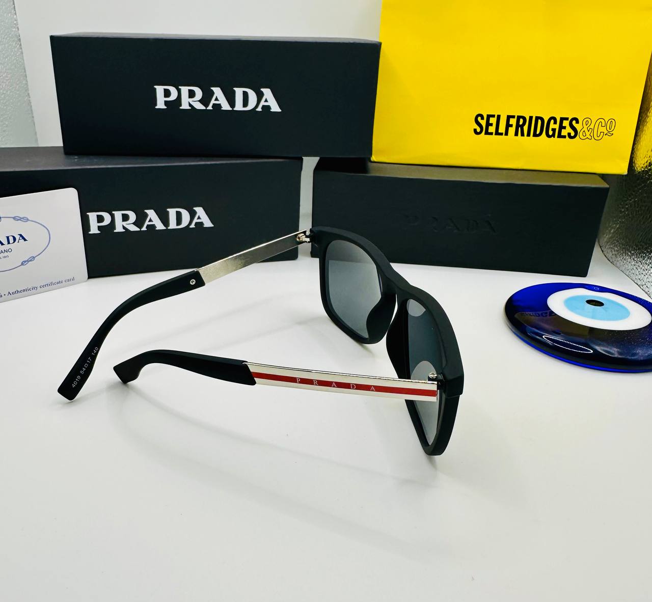 PRAD SUNGLASSES WITH BOX AND PAPERWORK to2610