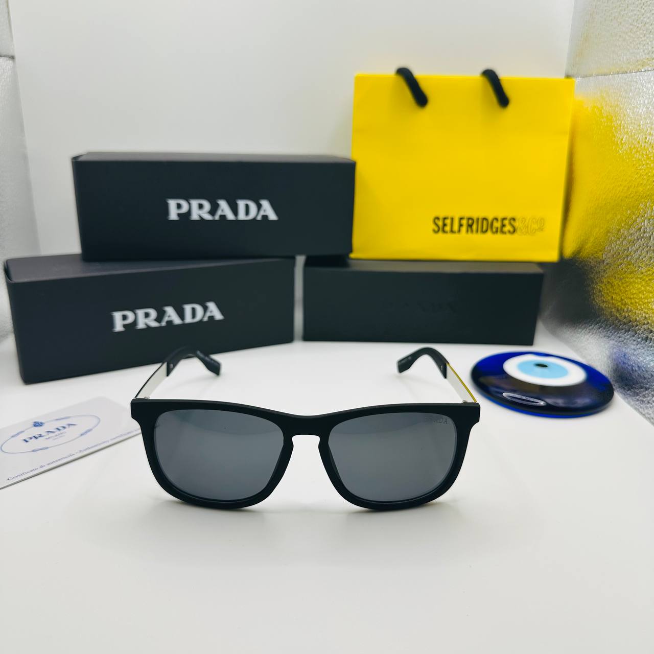 PRAD SUNGLASSES WITH BOX AND PAPERWORK to2610