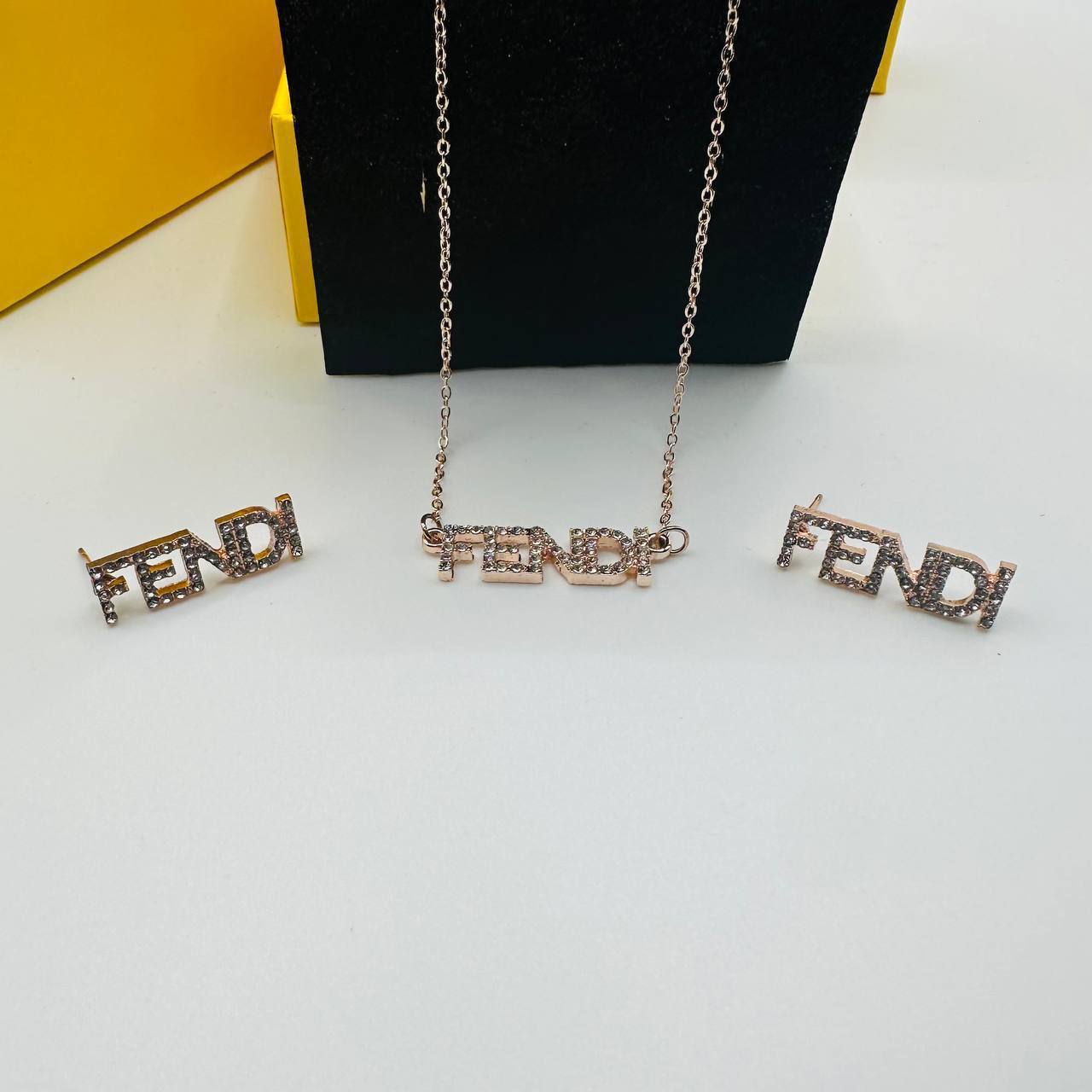 Fend earings and necklace set with packaging to1212
