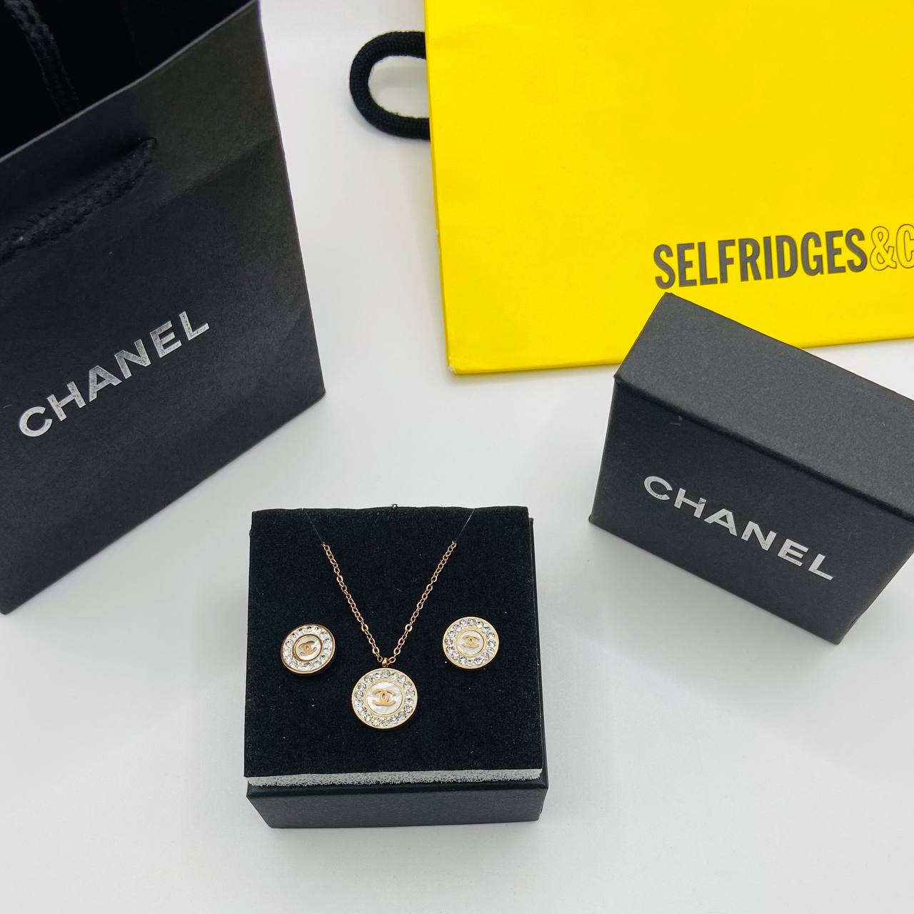 Chanl earings and necklace set with packaging to1809