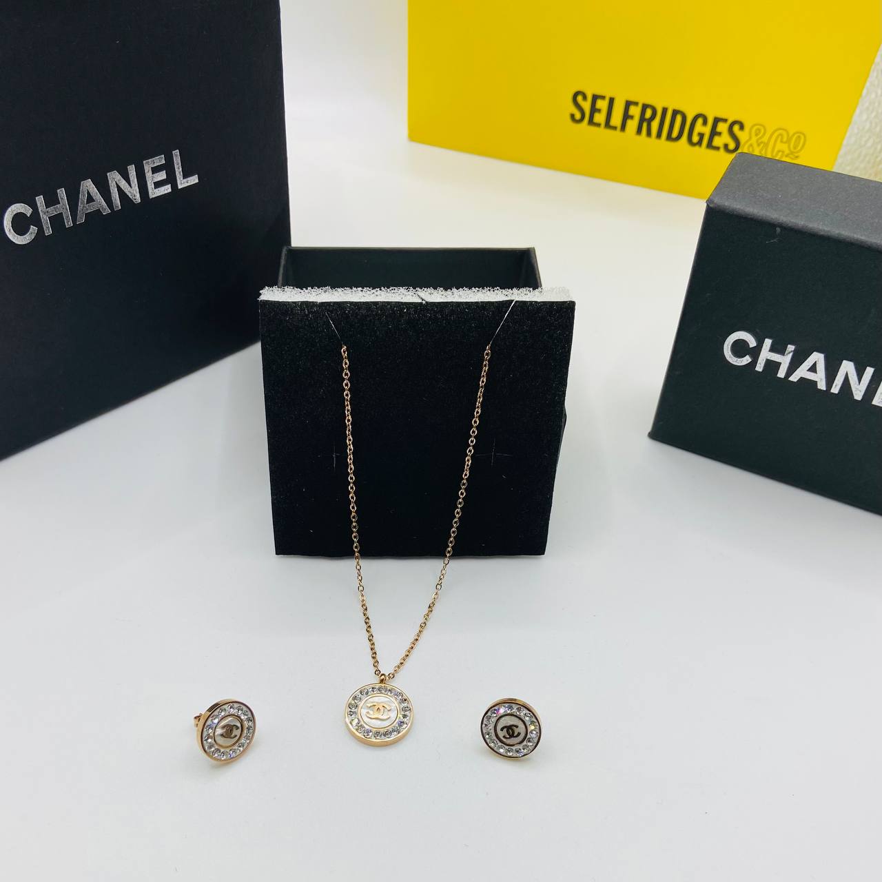 Chanl earings and necklace set with packaging to1809