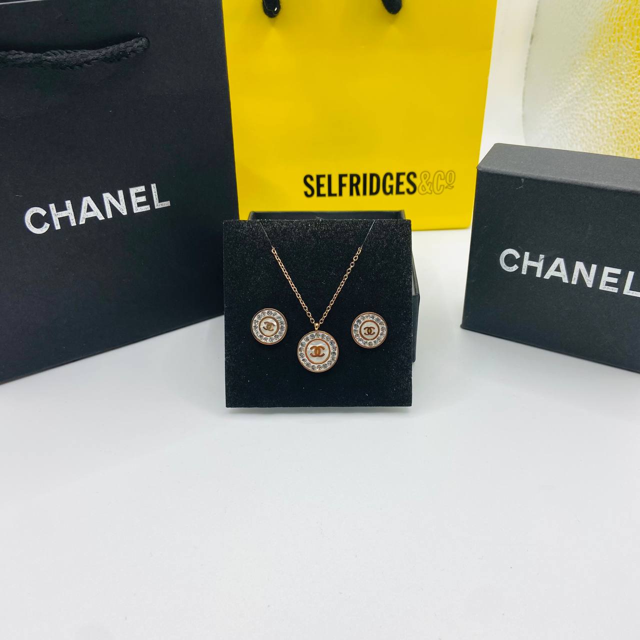 Chanl earings and necklace set with packaging to1809