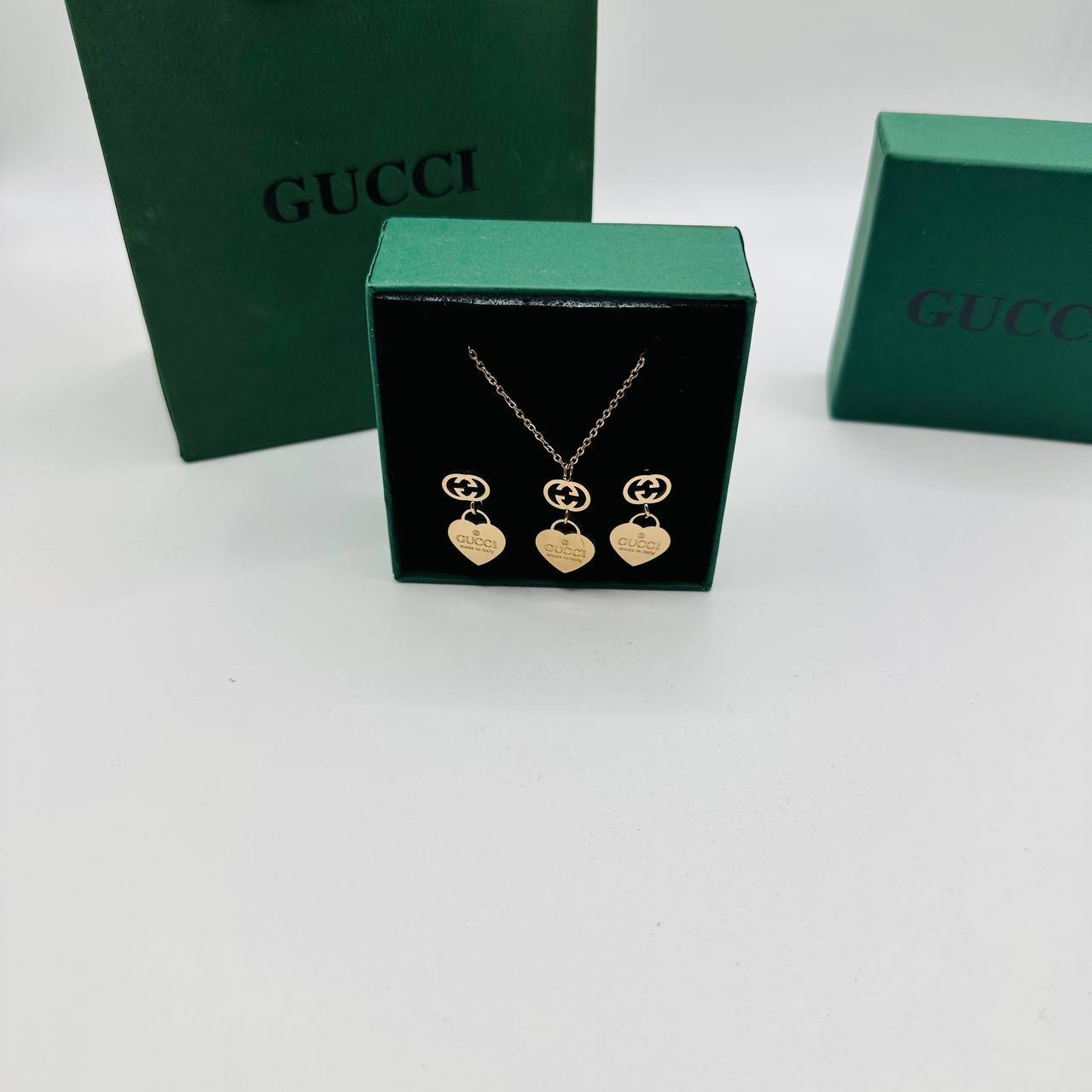 Gucc earings and necklace set with packaging to2412