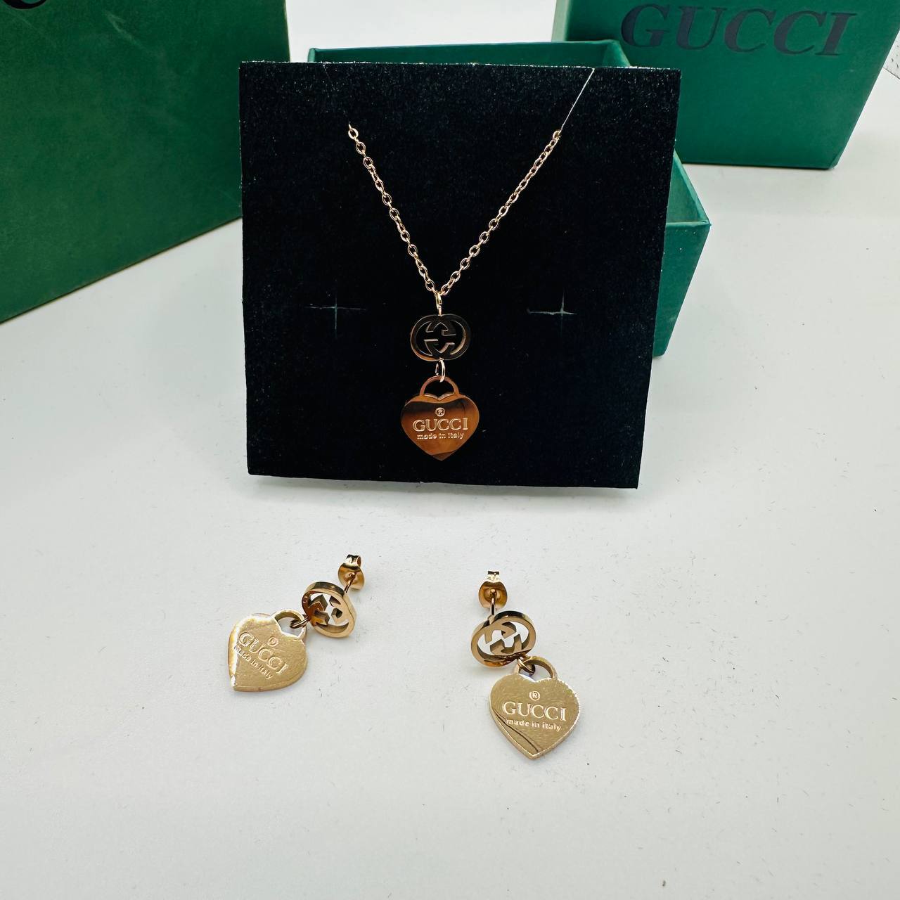 Gucc earings and necklace set with packaging to2412