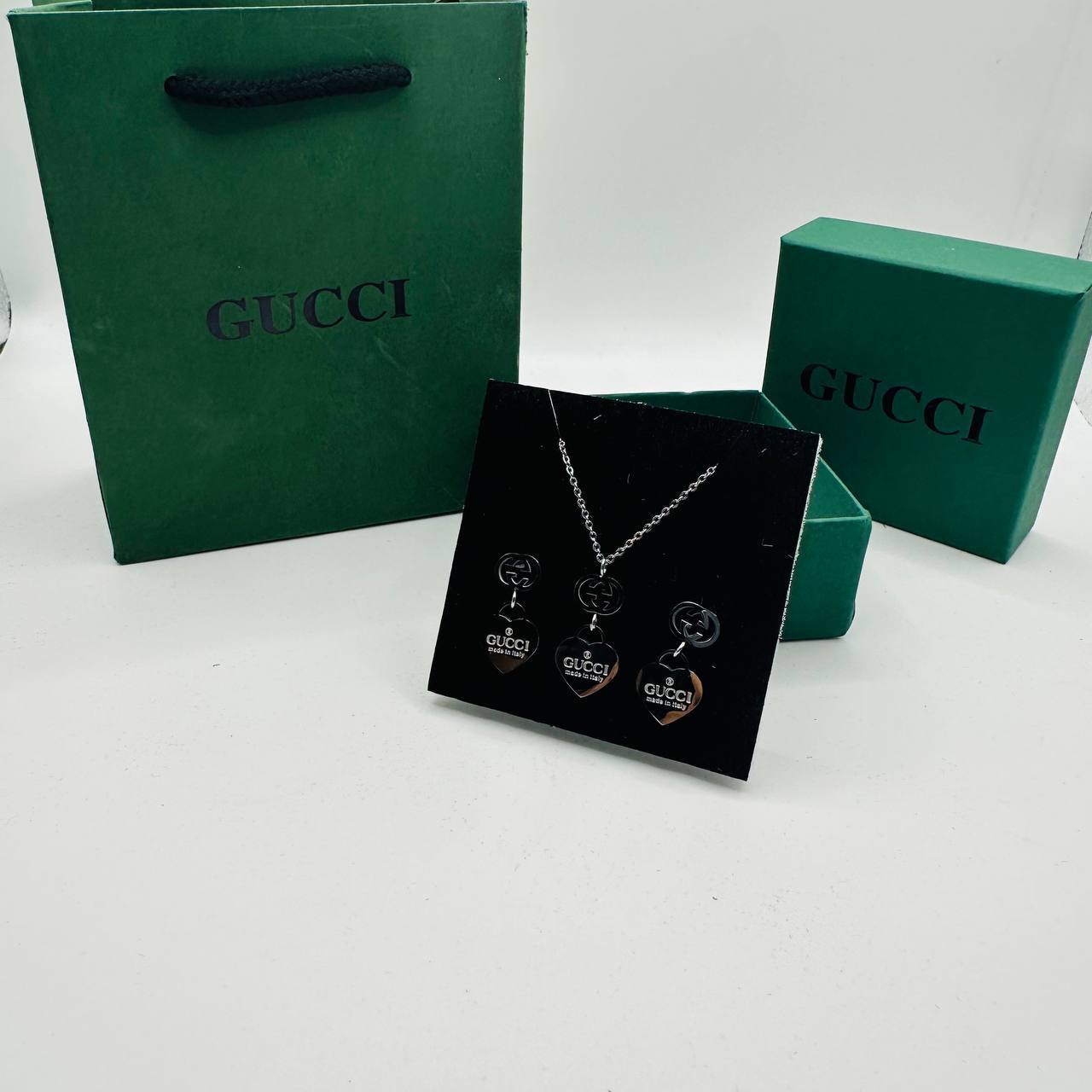 Gucc earings and necklace set with packaging to2412