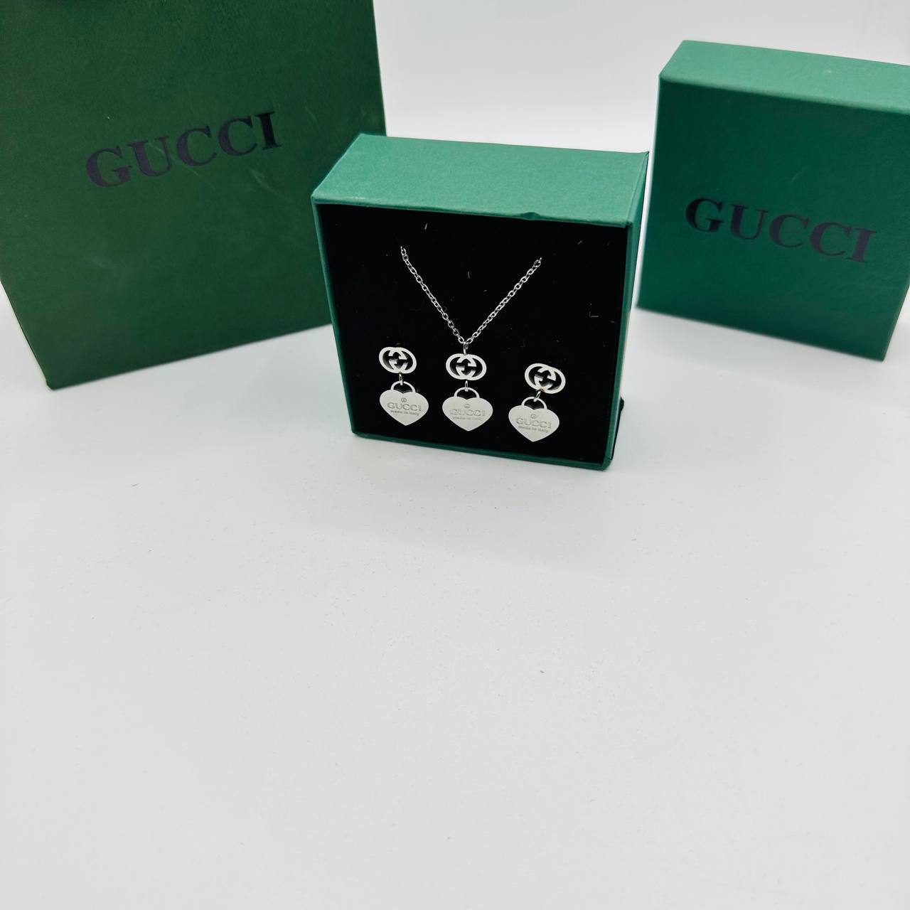 Gucc earings and necklace set with packaging to2412