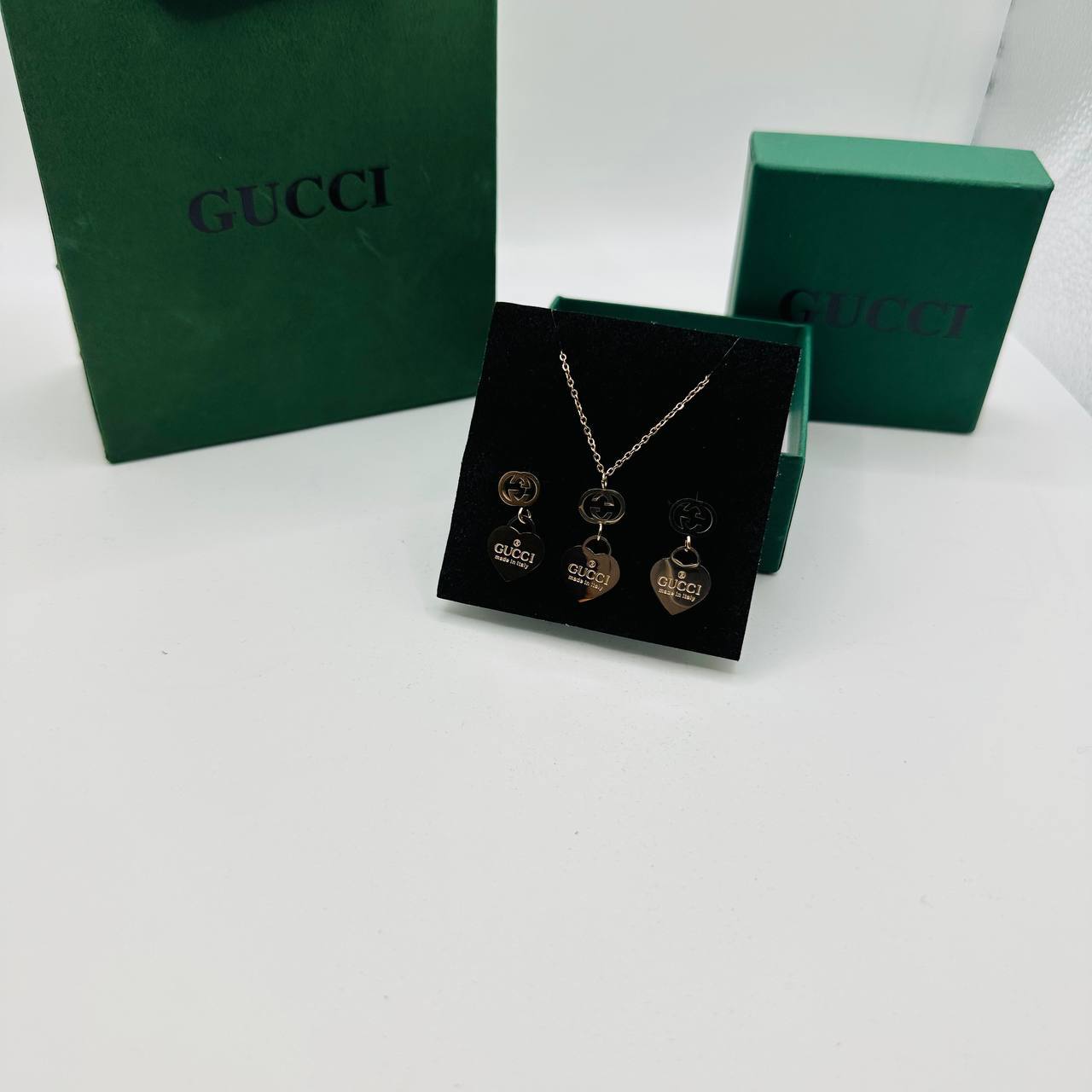 Gucc earings and necklace set with packaging to2412