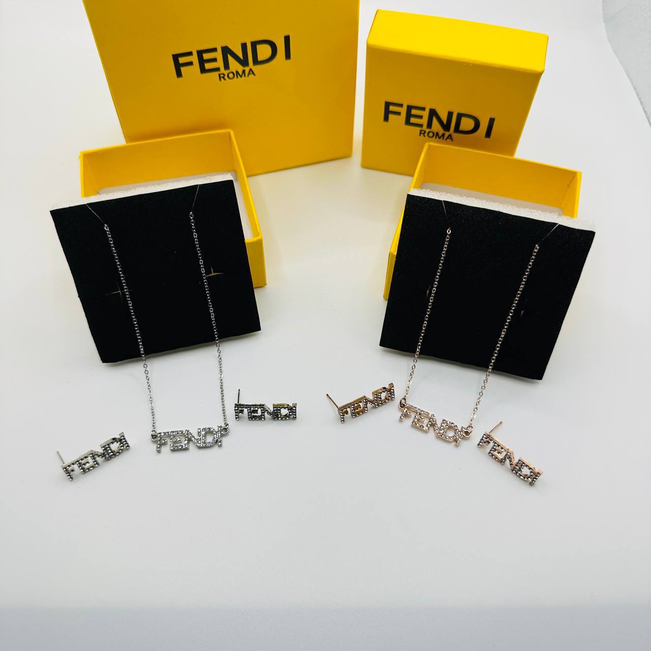 fend earings and necklace set with packaging to2909