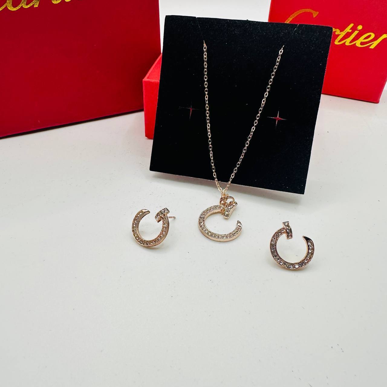 Cartie earings and necklace set with packaging to2904