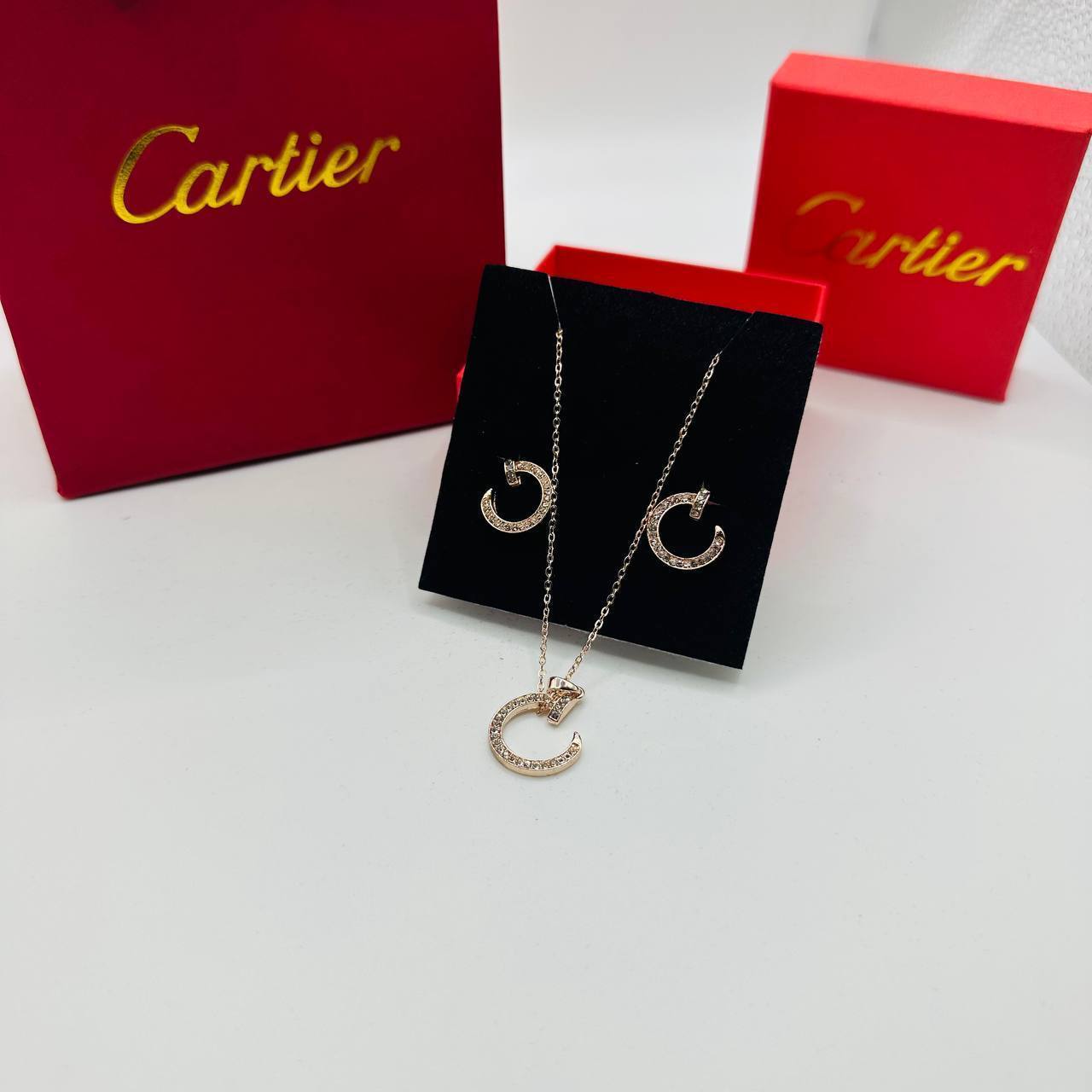 Cartie earings and necklace set with packaging to2904